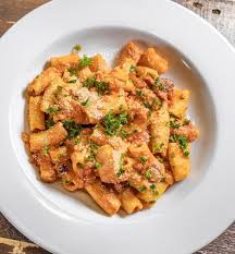 Juliet Italian Kitchen signature dishes Spicy Rigatoni alla VodkaChicken ParmigianaBolognese